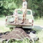 Unloading dirt from a pickup truck